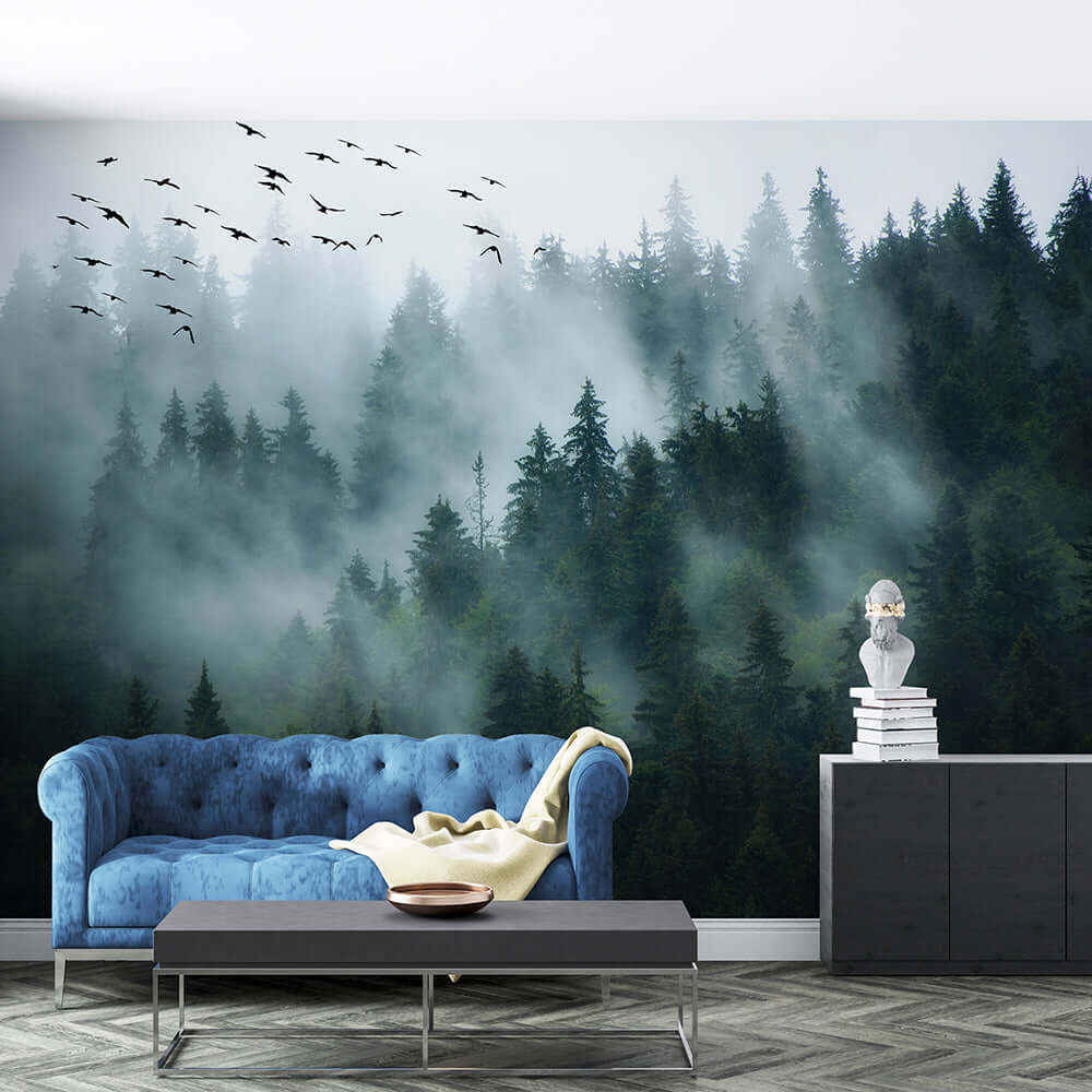 Breathe in the Forest. Every Day. Panoramic Mist Forest Wallpaper – Where Wilderness Meets Luxury. misty cedar forest mural with blue sofa and modern decor