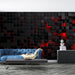 CyberGrid 3D Glowing Wall Panel - Red Tech Illumination showcased on a bold red-accented geometric wall behind a modern living room with blue sofa