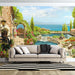Mediterranean courtyard wallpaper | Sea view garden style mural with blue-green sea, lush plants, stone villa and pool backdrop for a romantic European vibe