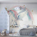 watercolor unicorn mural wallpaper in a dreamy kids room with soft rainbow and celestial details