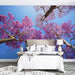 Blue Jacaranda Sky Wallpaper | Blue Jacaranda Sky Mural - romantic pink purple jacaranda blossoms against clear blue sky in a serene bedroom wall mural