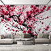Chinese Pink Plum Blossom Wallpaper Mural - Elegant Floral Design with Black Branches in a living room setting