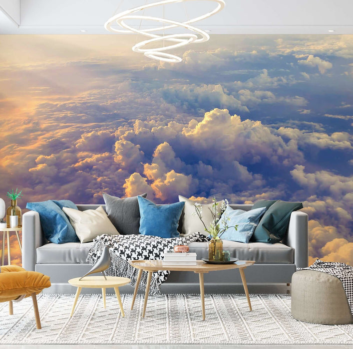 Dawn Cloudscape Mural Wallpaper | Serene Sky Elegance for Bedroom & Living Room – Cloudscape mural over sunset sky with pastel clouds in a cozy living room