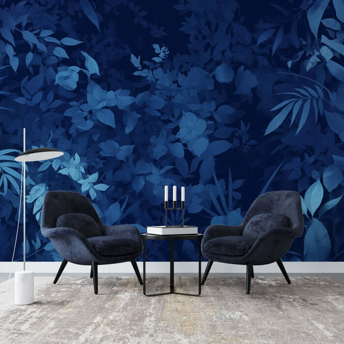 Deep Blue Tropical Plant Wallpaper Mural | Living Room and Bedroom Decoration with dark navy leaves backdrop and modern seating