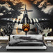 Fighter Wallpaper Mural: Vintage Aviation Meets Urban Elegance - WWII Fighter Plane with black-and-white stripes and orange-black checkered tail over city skyline