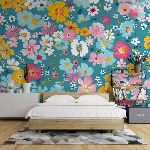 Flower wallpaper mural | Multi colored small flowers on a blue background - Carving wallpaper