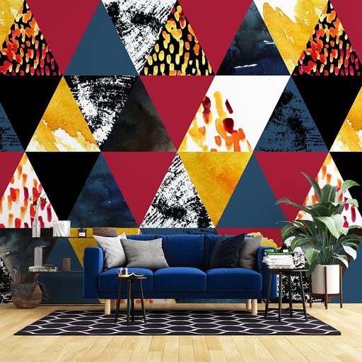 Geometric abstract wallpaper mural with colorful triangle splicing in modern living room decor.