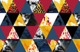 Colorful geometric abstract wallpaper mural featuring triangles in red, yellow, black, white, and blue textures.