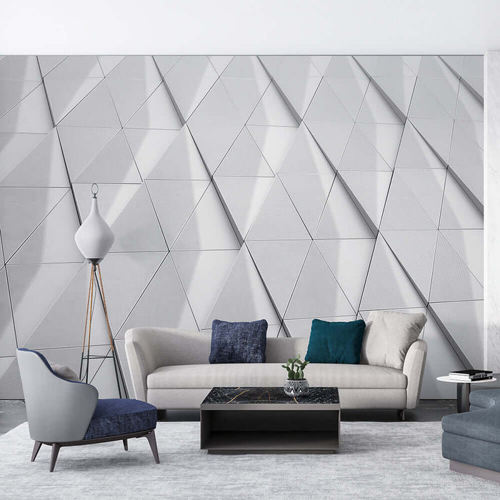 Geometric Triangle Wallpaper Mural | Advanced Grey Tone - Futuristic 3D triangle wall design in a modern living room with sleek gray tones, minimalist furniture, and luxurious ambiance