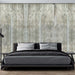 Industrial Cement Texture Wallpaper - Minimalist & Luxury Wall Design for Living Room & Bedroom used as a backdrop in modern bedroom with concrete wall and sleek bed