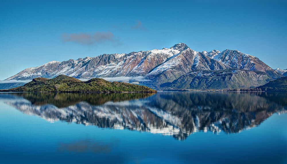 Landscape Reflection Wallpaper Mural | Natural Healing Decorative Wall - tranquil mountain lake scene with snow-capped peaks and pristine reflections