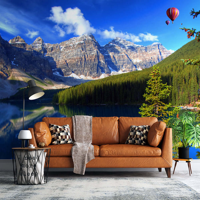 Landscape Wallpaper Mural | Natural Landscape Wall Decoration – immersive Banff Park scene with mountains, lake, and hot air balloons behind a brown leather sofa in a living space