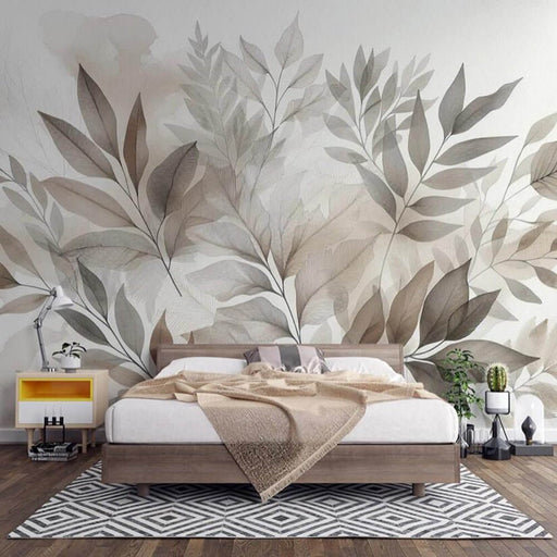 Large leaf plant mural wallpaper | Watercolor painting in a serene bedroom with a botanical wall mural, soft beige-gray tones, elegant leaf patterns, cozy bed setup.