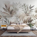 Large leaf plant mural wallpaper | Watercolor painting in a serene bedroom with a botanical wall mural, soft beige-gray tones, elegant leaf patterns, cozy bed setup.