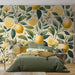 Lemon Garden Wallpaper Mural | Emerald Leaves with Yellow Citrus and Blossoms - Lemon wallpaper mural featuring emerald leaves, whole lemons and blossoms