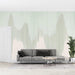 Light green abstract landscape wallpaper mural | Light green and beige in a serene living room with a gray sofa, minimalist decor, and a potted plant