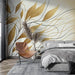 Modern Gold Leaf Line Wallpaper Mural | Minimalist Botanical Art for Luxe Interiors: gold leaf botanical wall mural in a chic bedroom with gray linens and a tan chair