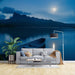 Moon Night Lake Landscape Wallpaper Mural | Moon and Mountains - tranquil moonlit lake scene with boat, greenery, and mountains reflected in calm blue water