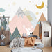 Mountain elk wallpaper mural | Children's room mural featuring mountain, elk silhouette, pastel pink peaks, and celestial accents for a forest-inspired bedroom