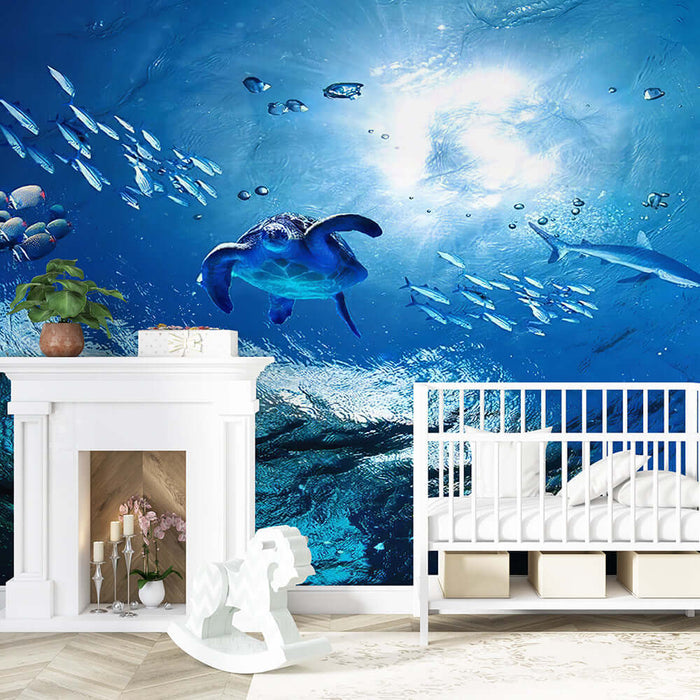 Ocean themed wallpaper | Children's room ocean mural with immersive marine ecology art featuring sea turtles, fish schools, sunlight gradients from light to deep blue