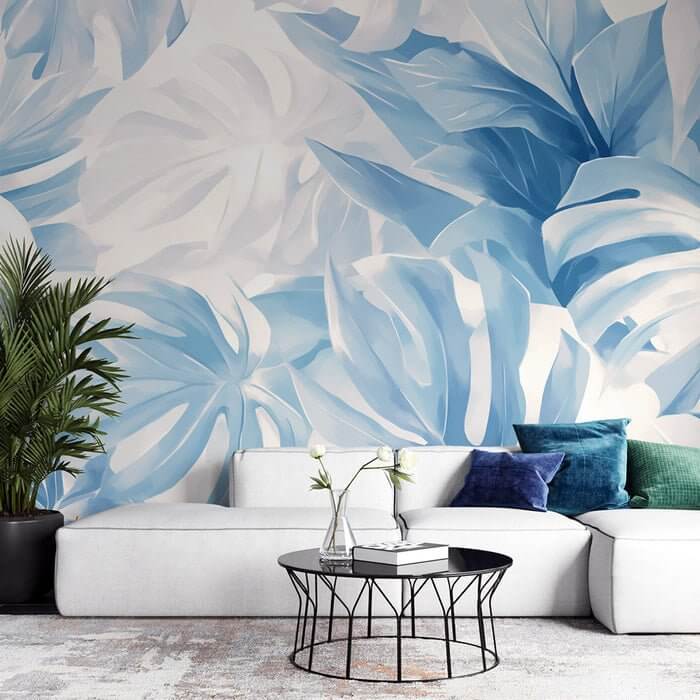 Oceanic Breeze Botanical Wallpaper Mural | Blue & White Leaf Design | Modern Serene Décor for Bedroom & Living Room with coastal blue leaves in a serene living room