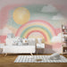 Rainbow & Cloud Wallpaper Mural | Dreamy Kids Room & Nursery Decor | Soft Watercolor Style Wall - whimsical rainbow, sun, clouds, and cute animal cushions in a dreamy nursery.