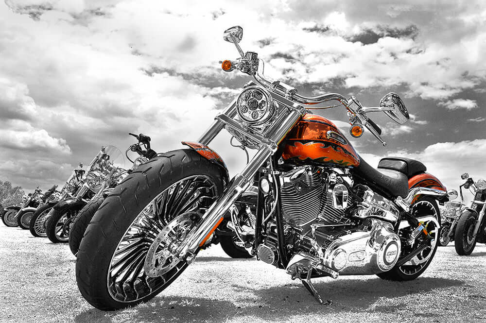 Retro Harley motorcycle wallpaper mural | Street cool motorcycle: Chrome Harley with orange flame coat on black/gray backdrop, industrial style wall art for living room or bedroom.