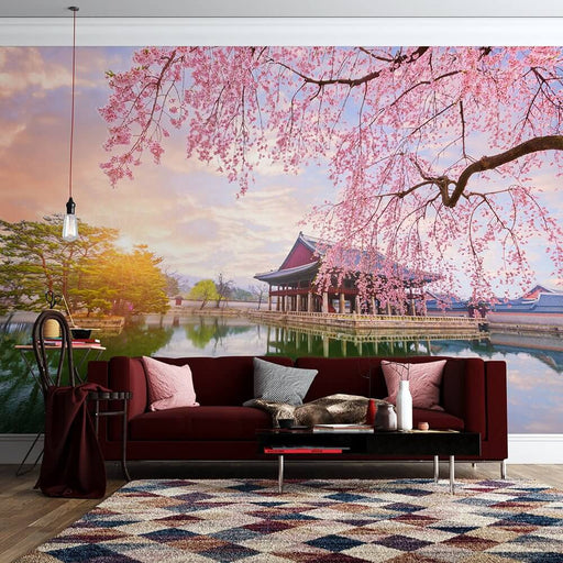 Sakura Ancient Architecture Wallpaper Mural | Japan with lush cherry blossoms, koi-like reflections, and serene ancient buildings over calm water