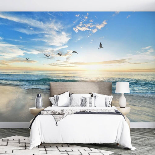 Sea View Sunrise Wallpaper Mural | Blue Sky, Waves, Beach, and Soaring Seagulls