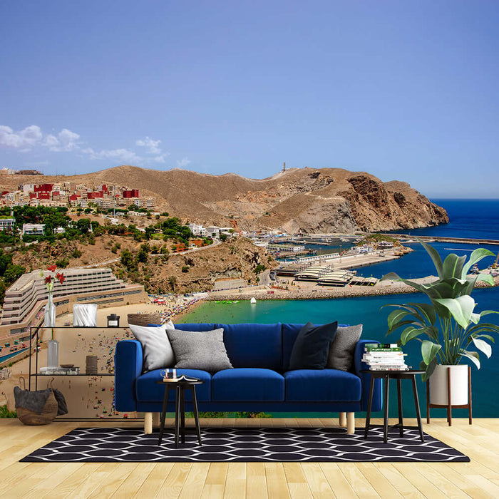 Seaside vacation scenery wallpaper| Mediterranean decorative mural - blue sofa in living room with Mediterranean coast landscape art backdrop