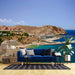 Seaside vacation scenery wallpaper| Mediterranean decorative mural - blue sofa in living room with Mediterranean coast landscape art backdrop