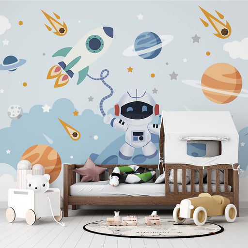 Space astronaut playful wallpaper | Children's bedroom mural featuring astronaut, rockets, and planets for an interstellar-themed kids room