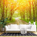 Sunlit Forest Path Wallpaper Mural | Woodland Escape with Light Penetration | Tranquil Green Décor