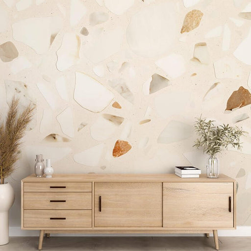 Terrazzo wallpaper mural | Geometric fragment pattern showcases soft neutral tones in a modern living room with a wooden sideboard
