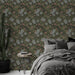 Vintage Floral Wallpaper | Botanical Green Leaf Mural with Subtle Blue & Pink Blooms in a cozy bedroom setting