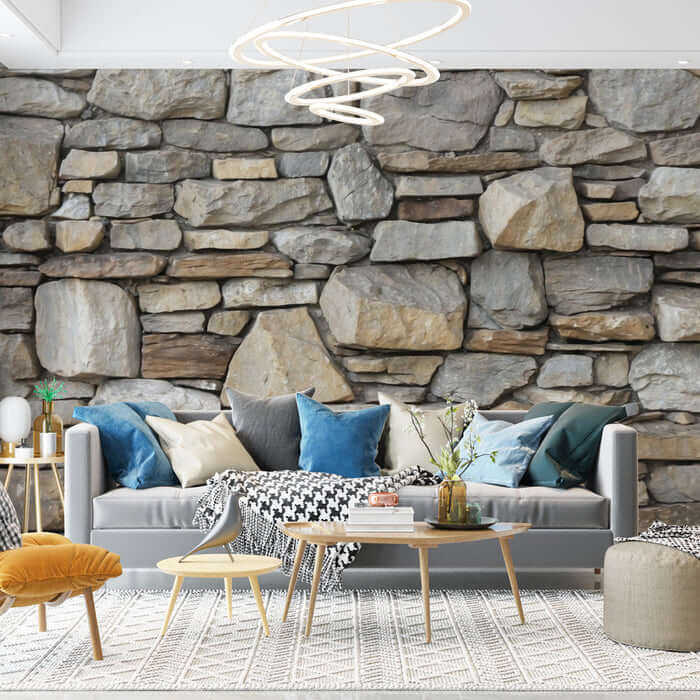 Vintage stone wall texture wallpaper in a stylish living room with cozy furniture and decorative elements.