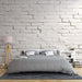 White brick textured wallpaper mural | Nostalgic style -  minimalistic bedroom with serene, modern Scandinavian decor featuring white brick walls