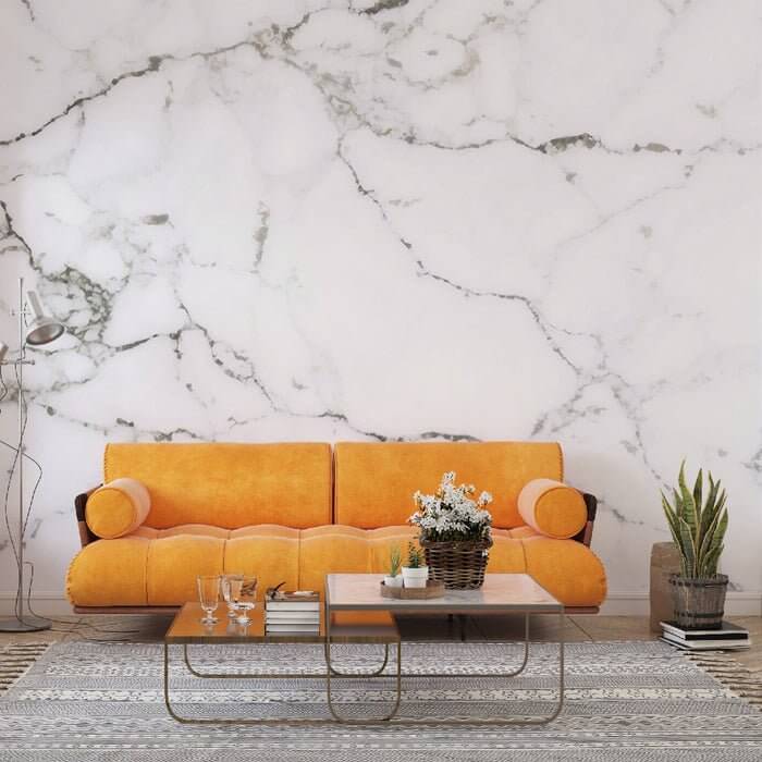 White Marble Wallpaper Mural - Elegant & Luxurious Texture: modern living room with orange sofa, marble wall, greenery, and stylish coffee table