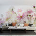 Wildflower mural wallpaper | Light pink: soft pink flowers on hazy floral mural creating a romantic, elegant living room backdrop